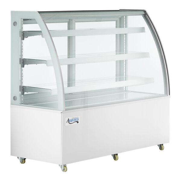 An Avantco white refrigerated bakery display case with curved glass shelves.