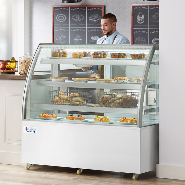 a display case with pastries and pastries