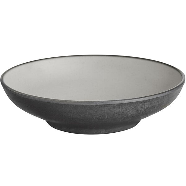 A close up of an Acopa matte grey and black melamine bowl with a grey rim.