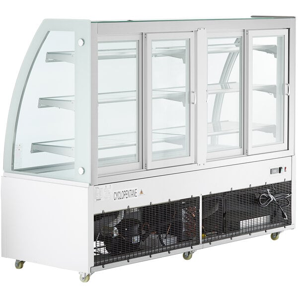 An Avantco white refrigerated bakery display case with curved glass doors.