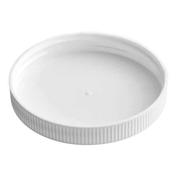 A white ribbed plastic cap with a flat top and no lining.