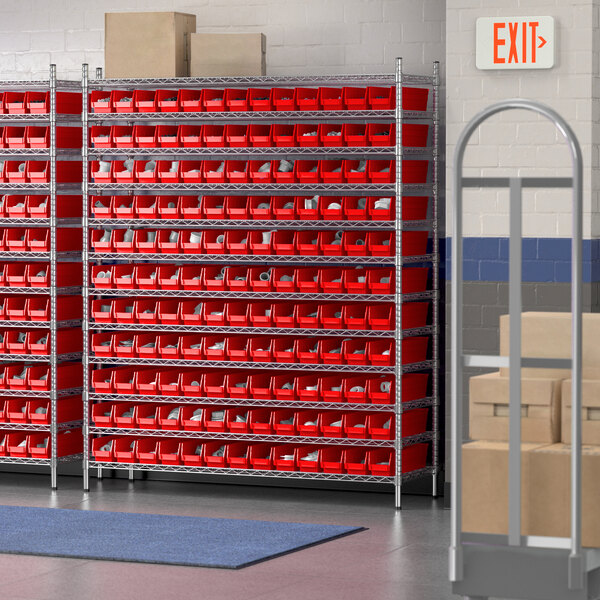 A Regency wire shelving unit with red bins on metal shelves.
