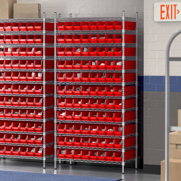A Regency wire shelving unit with red bins on shelves.