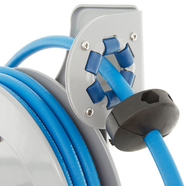 A T&S blue and white open epoxy coated steel hose reel with a front trigger water gun attached to blue and white hoses.
