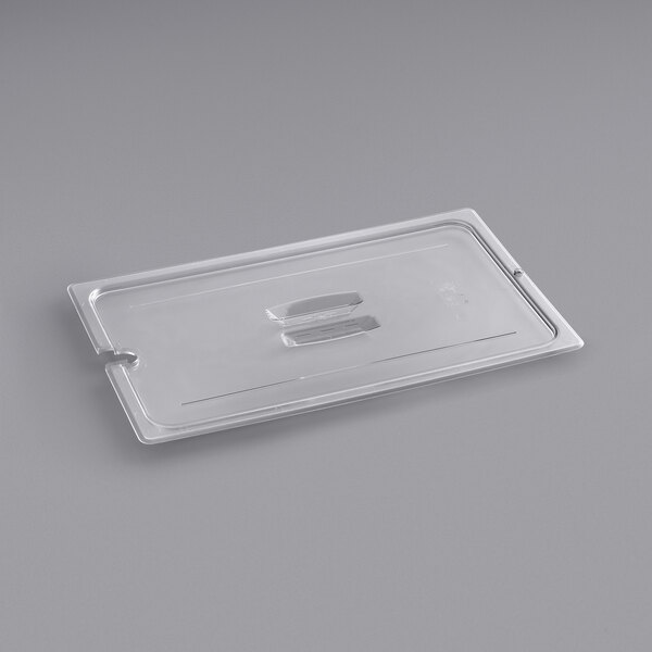 A clear plastic Cambro lid with a handle and spoon notch.