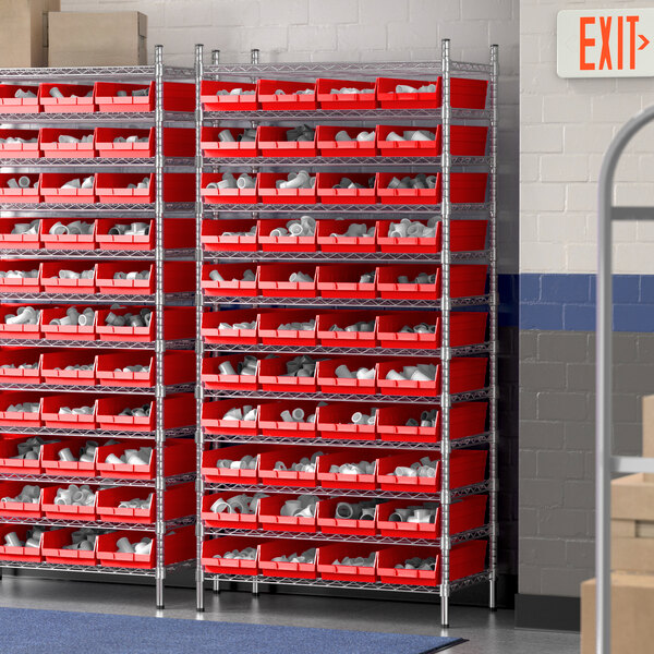 A Regency wire shelving unit with red bins on white shelves.