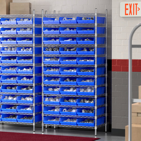 A Regency wire shelving unit with blue bins on shelves.