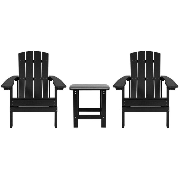 Two black Charlestown Adirondack chairs with a table.