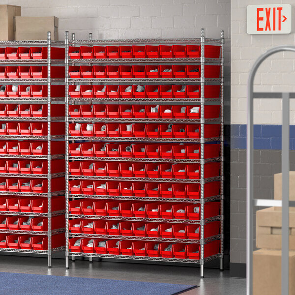 A Regency wire shelving unit with red bins on the shelves.