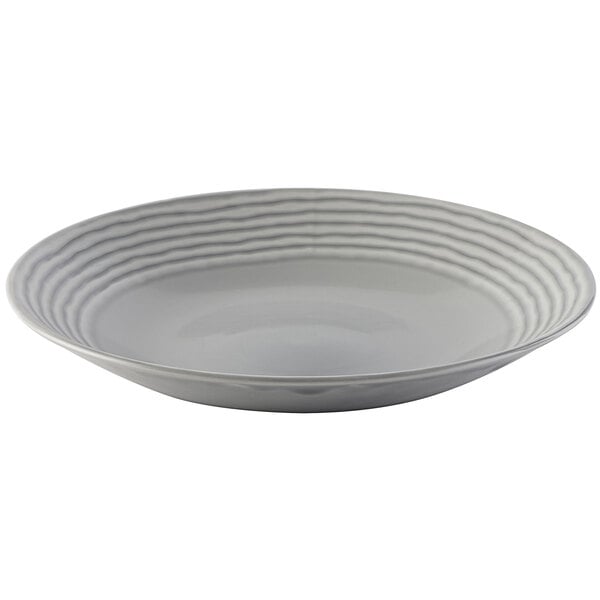 A white deep coupe plate with a grey wavy pattern.