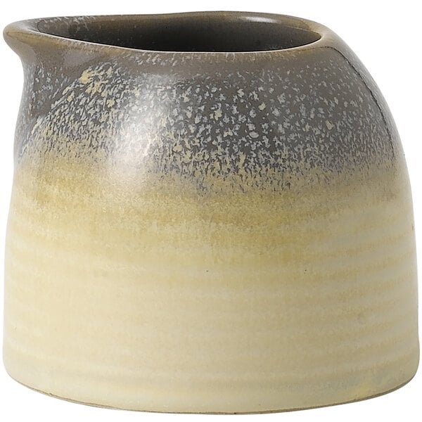 A Dudson Evo stoneware creamer in brown and white speckled design.