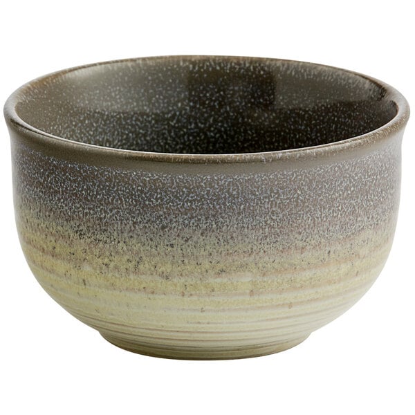 a bowl with a speckled surface