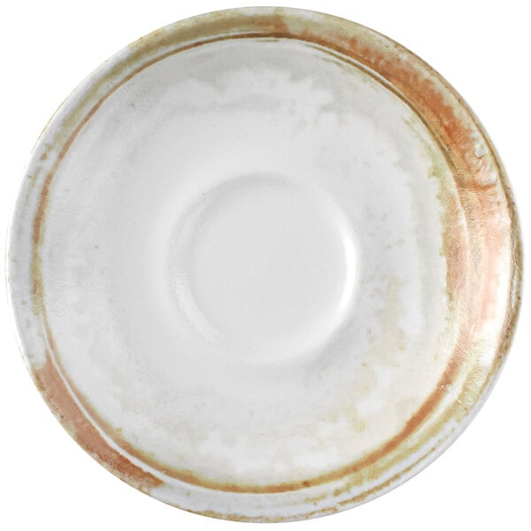 A close-up of a white Dudson Maker's Finca sandstone espresso saucer with a brown rim.