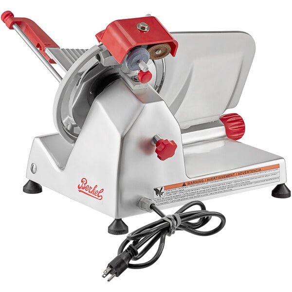 A Berkel medium-duty meat slicer with a red handle.