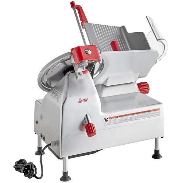 A Berkel meat slicer with a red handle.