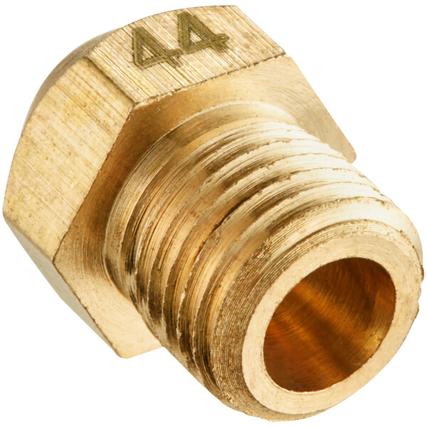 A gold nut with the number 44 on it.