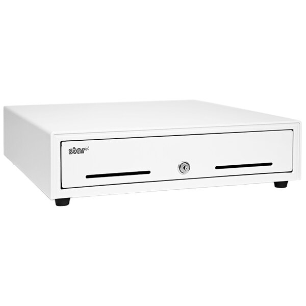 A white rectangular Star printer driven cash drawer with a black rectangular keyhole.