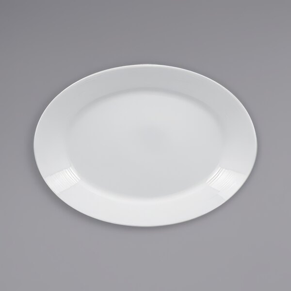 A white RAK Porcelain oval deep plate with a wide rim.