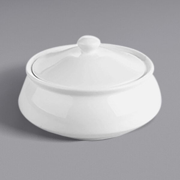 A RAK Porcelain white porcelain handi bowl with a white lid.