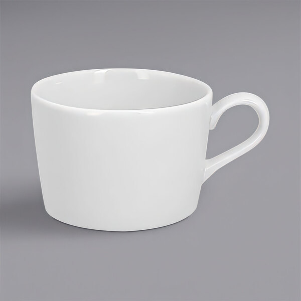 A RAK Porcelain bright white cup with a handle.