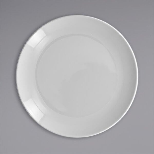 A white RAK Porcelain flat coupe plate.
