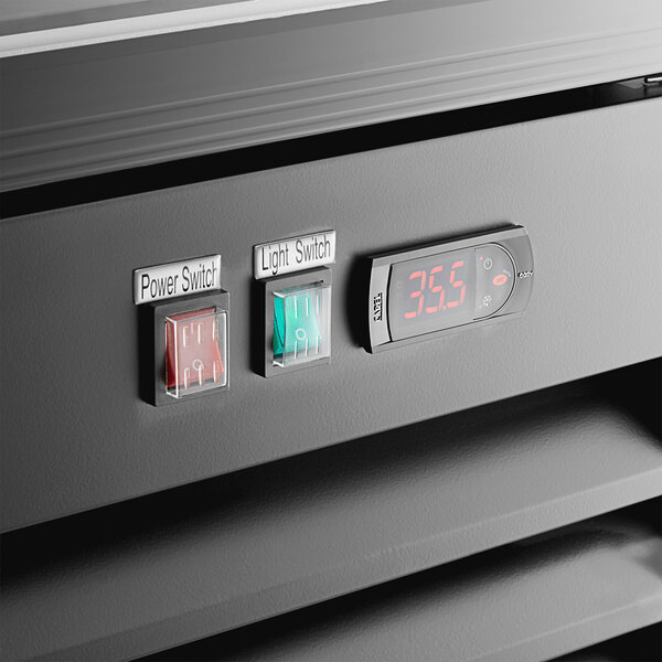 a digital thermostat on a wall