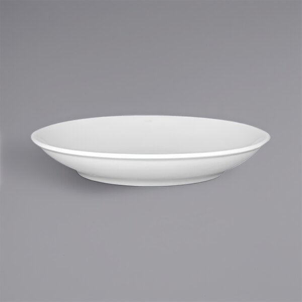 A white porcelain deep coupe plate with a black stripe on the rim.