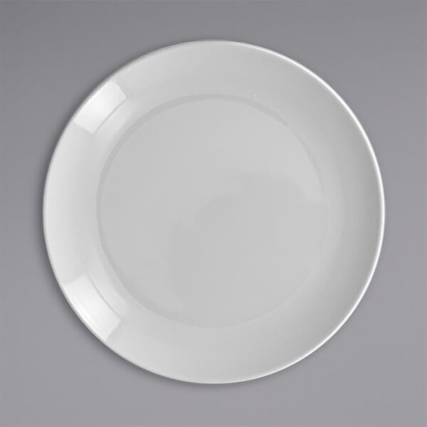 A white RAK Porcelain flat coupe plate on a white background.