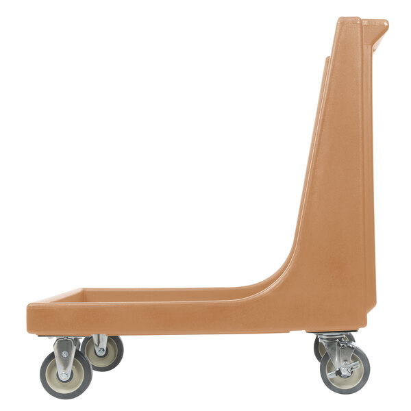A beige Cambro dolly with wheels for a Cambro tray or sheet pan carrier.
