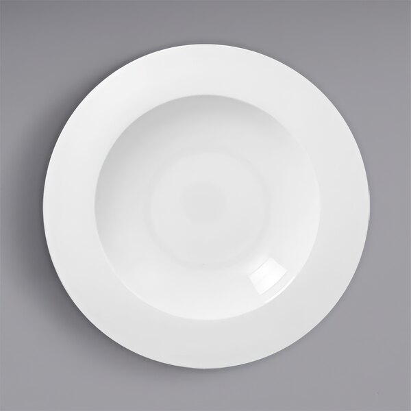 A white RAK Porcelain deep plate with a wide rim.