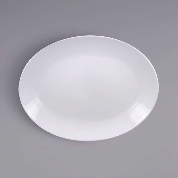 A white RAK Porcelain oval coupe platter on a white surface.