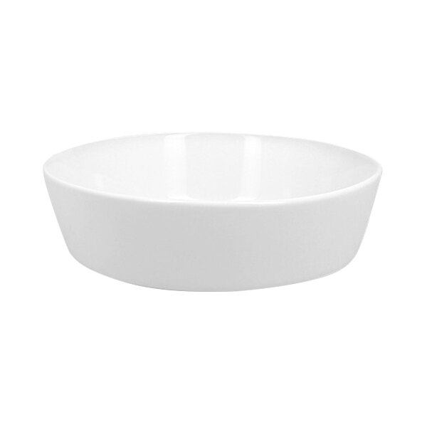 A bright white round stackable porcelain bowl.