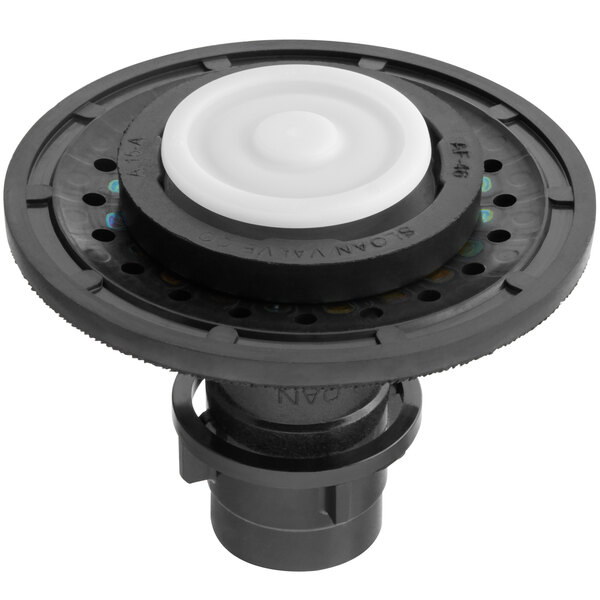 A black and white circular diaphragm repair kit with a white button in the middle.