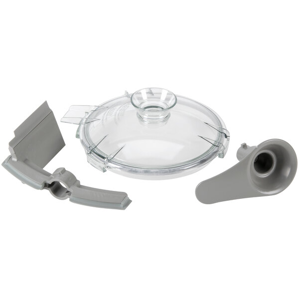 A clear glass bowl with a metal lid.