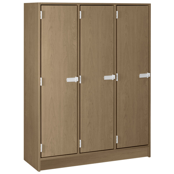 a brown locker with white handles