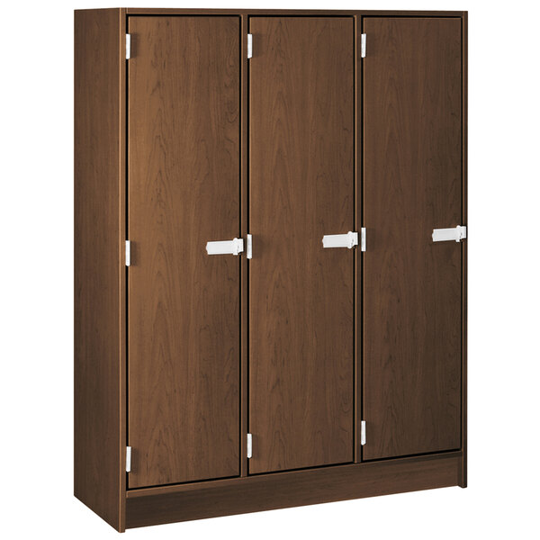 A dark walnut wooden triple storage locker with doors and white handles.