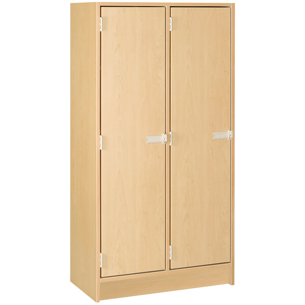 A maple wooden I.D. Systems double storage locker with doors.