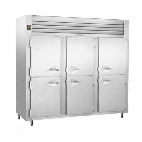 A stainless steel Traulsen reach-in freezer with three solid half doors and handles.