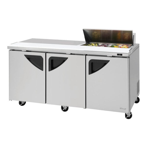 A stainless steel Turbo Air 3 door sandwich prep table with a left work station.