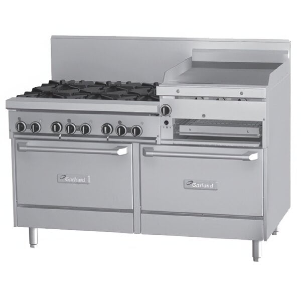 A large stainless steel Garland commercial gas range with 6 burners, a griddle, and broiler.