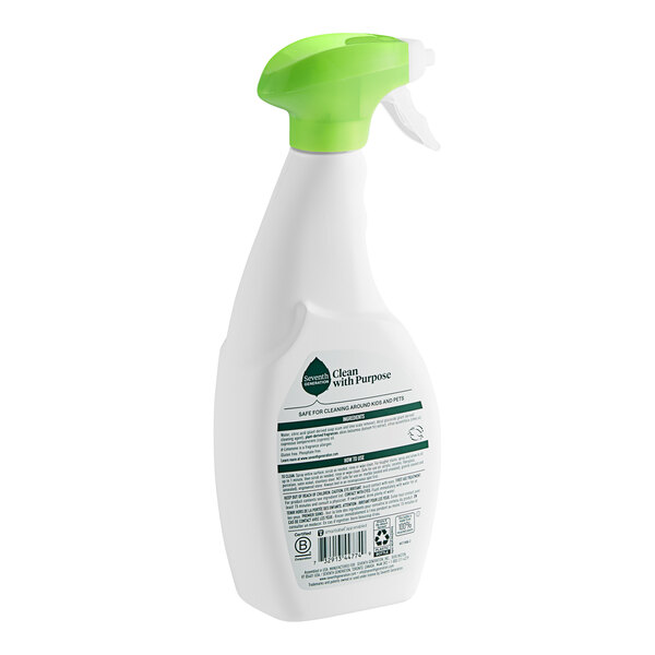 A white spray bottle with a green label and cap of Seventh Generation Emerald Cypress and Fir Tub and Tile Cleaner.