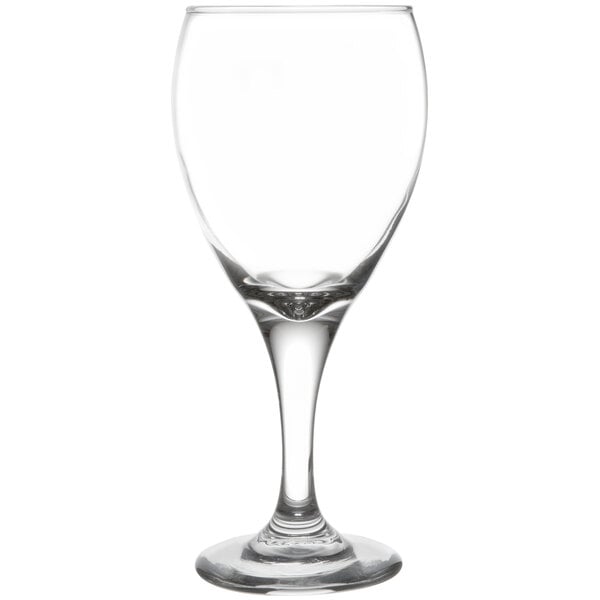 A close-up of a clear Libbey Teardrop wine glass.
