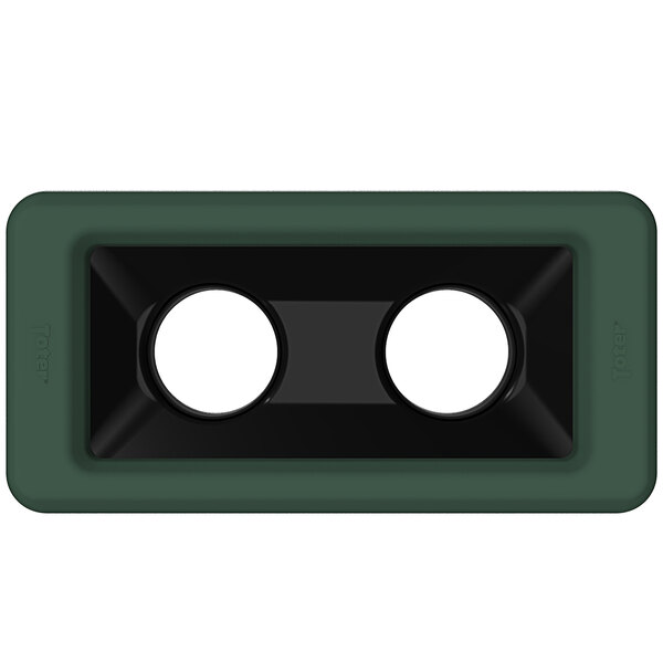 A green rectangular Toter lid with black and white circles.