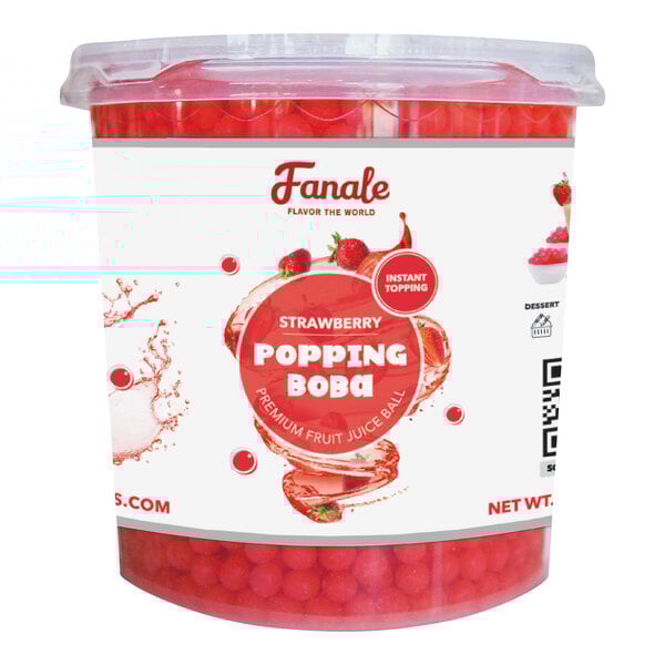 A container of Fanale Strawberry Popping Boba with red fruit juice balls.