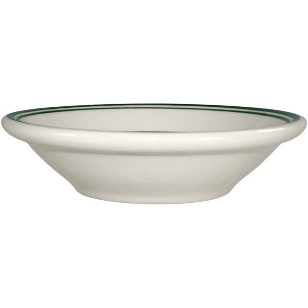 An International Tableware Verona stoneware fruit bowl with a white background and green bands on the rim.