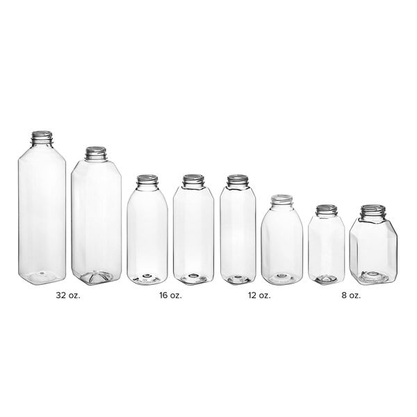 A row of clear 16 oz. tall square PET juice bottles.