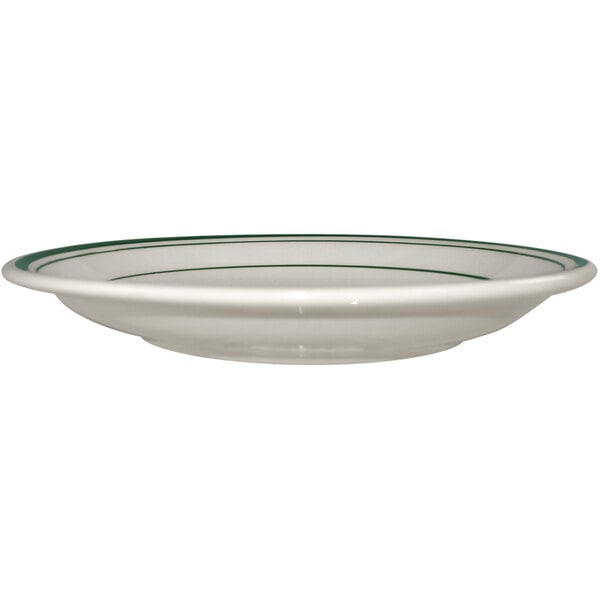 An International Tableware ivory stoneware saucer with green stripes.