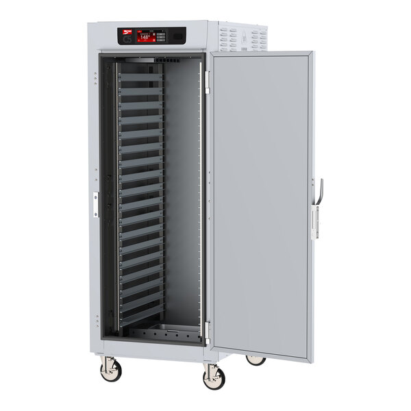 A white metal Metro C5 heated holding cabinet with wheels and open doors.