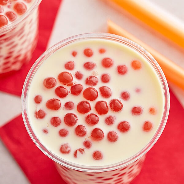 A cup of milk with Fanale Pomegranate Popping Boba.