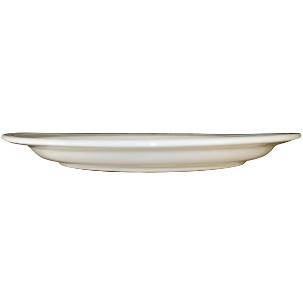 An International Tableware York ivory stoneware platter with an embossed rim.